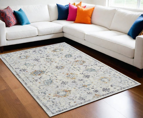 5' X 8' Ivory and Blue Floral Area Rug