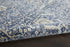 5' X 8' Blue And Cream Floral Non Skid Area Rug With Fringe