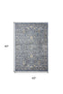 5' X 8' Blue And Cream Floral Non Skid Area Rug With Fringe