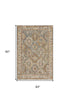 5' X 8' Beige Blue And Brown Geometric Distressed Area Rug