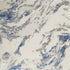 8' X 11' Ivory Blue And Gray Abstract Non Skid Area Rug