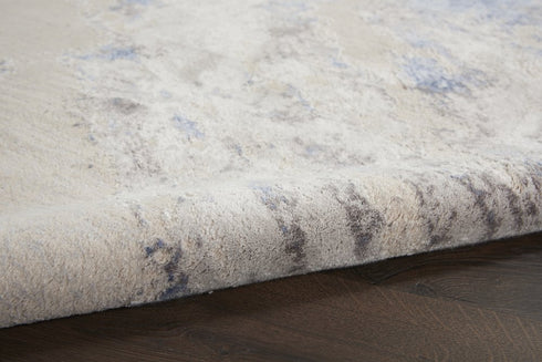 8' X 11' Ivory Blue And Gray Abstract Non Skid Area Rug