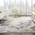 8' X 11' Ivory Blue And Gray Abstract Non Skid Area Rug