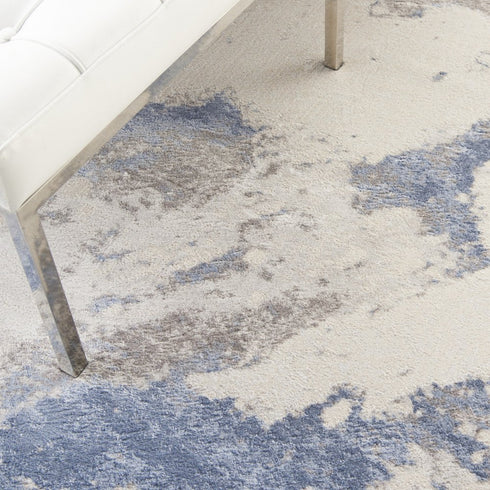 8' X 11' Ivory Blue And Gray Abstract Non Skid Area Rug