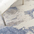 8' X 11' Ivory Blue And Gray Abstract Non Skid Area Rug