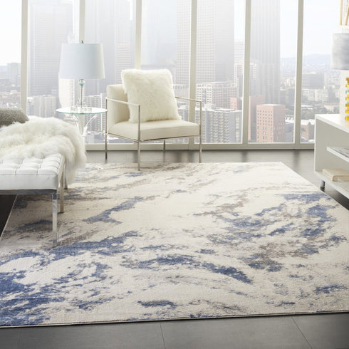 8' X 11' Ivory Blue And Gray Abstract Non Skid Area Rug