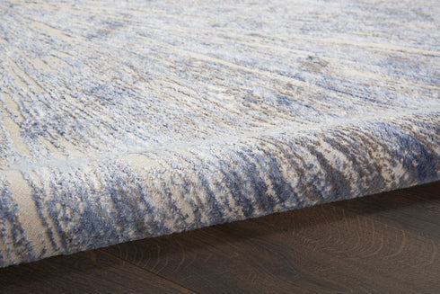 8' X 11' Cream Gray And Blue Abstract Non Skid Area Rug