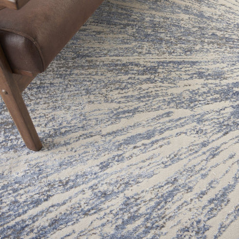 8' X 11' Cream Gray And Blue Abstract Non Skid Area Rug