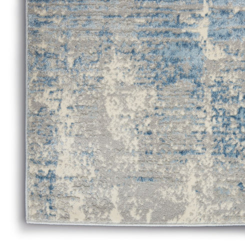 8' X 10' Ivory Blue And Gray Abstract Distressed Area Rug