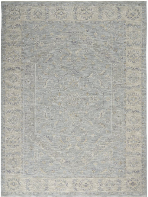 8' X 10' Teal and Ivory Floral Power Loom Area Rug