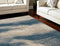 8' X 11' Ivory and Teal Blue Abstract Non Skid Area Rug