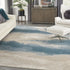 8' X 11' Ivory and Teal Blue Abstract Non Skid Area Rug