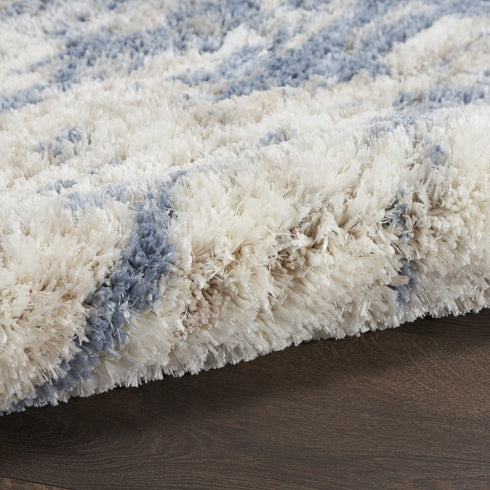 7' X 9' Light Blue Gray and Beige Abstract Shag Area Rug