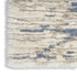 7' X 9' Light Blue Gray and Beige Abstract Shag Area Rug