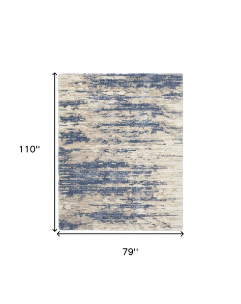 7' X 9' Light Blue Gray and Beige Abstract Shag Area Rug