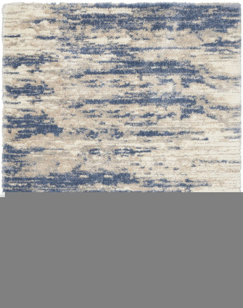 7' X 9' Light Blue Gray and Beige Abstract Shag Area Rug
