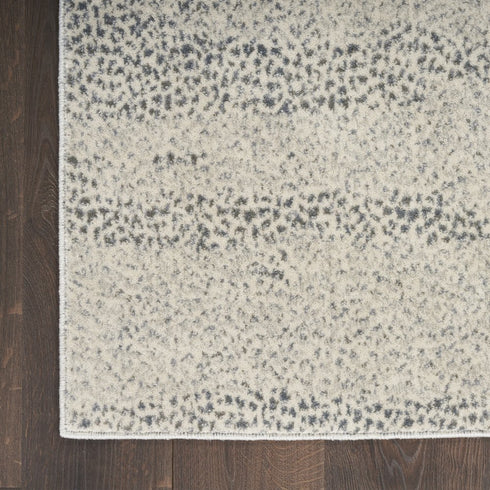 8' X 11' Beige And Gray Abstract Area Rug