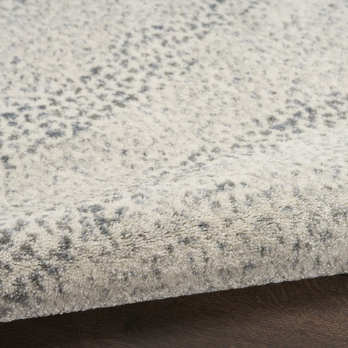 8' X 11' Beige And Gray Abstract Area Rug