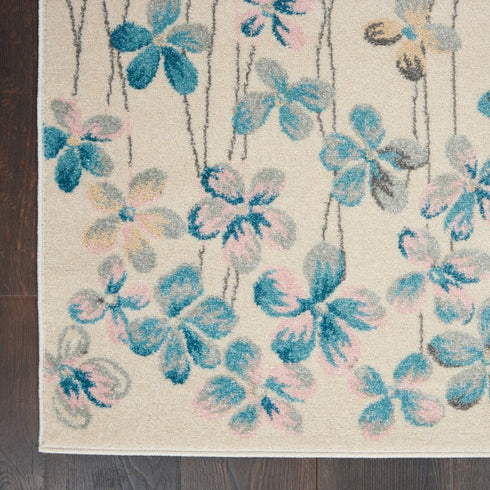 9' X 12' Ivory And Blue Floral Area Rug