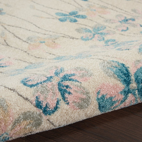 9' X 12' Ivory And Blue Floral Area Rug
