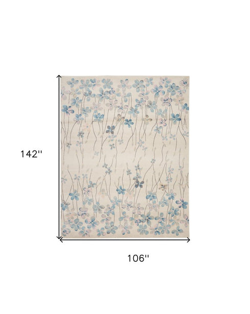 9' X 12' Ivory And Blue Floral Area Rug