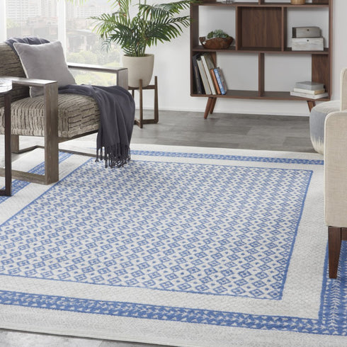 8' X 12' Ivory and Blue Geometric Distressed Non Skid Area Rug