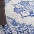 8' X 12' Ivory and Blue Floral Medallion Distressed Non Skid Area Rug
