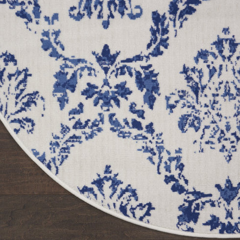 8' Ivory and Navy Blue Damask Distressed Round Rug