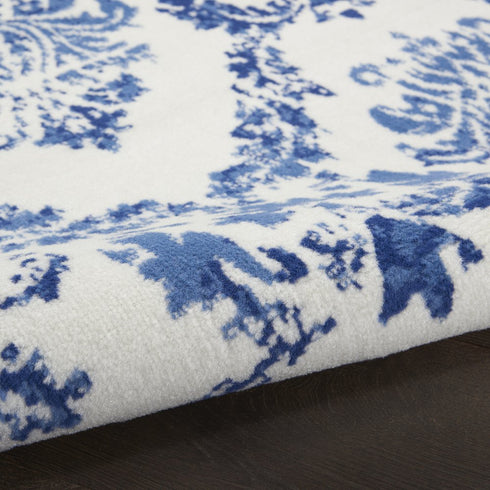 8' Ivory and Navy Blue Damask Distressed Round Rug