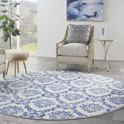 8' Ivory and Navy Blue Damask Distressed Round Rug