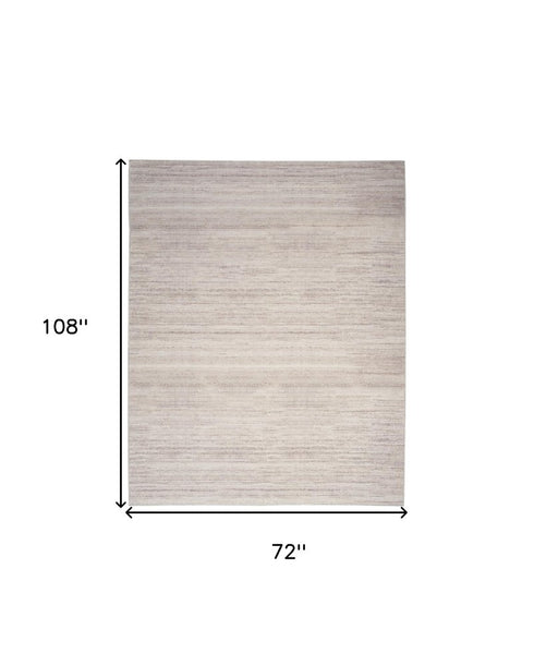 9' X 12' Ivory and Light Brown Abstract Washable Area Rug