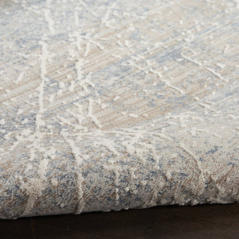 8' X 10' Beige Blue And Brown Abstract Area Rug