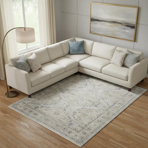 9' X 11' Beige And Ivory Floral Distressed Area Rug