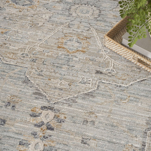 9' X 11' Beige And Ivory Floral Distressed Area Rug