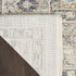 9' X 11' Beige And Ivory Floral Distressed Area Rug