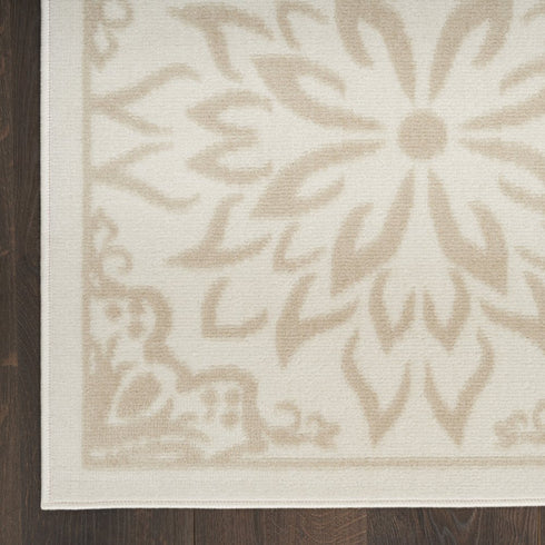 8' X 10' Beige And Ivory Floral Area Rug