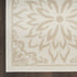 8' X 10' Beige And Ivory Floral Area Rug