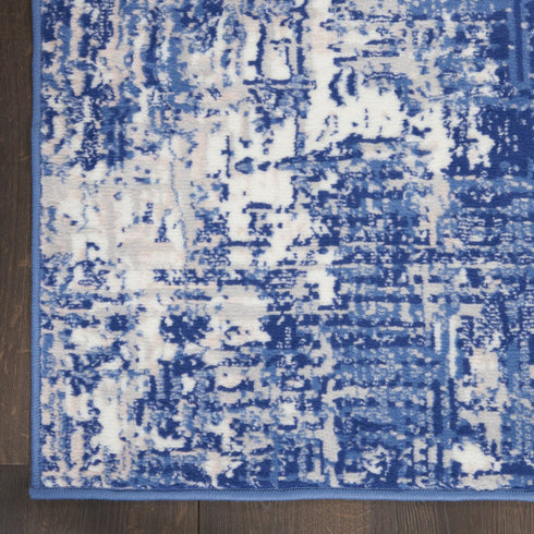 8' X 10' Ivory and Blue Abstract Distressed Area Rug