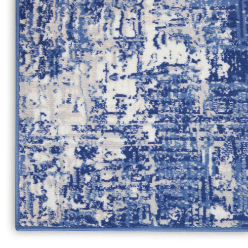 8' X 10' Ivory and Blue Abstract Distressed Area Rug