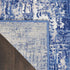 8' X 10' Ivory and Blue Abstract Distressed Area Rug