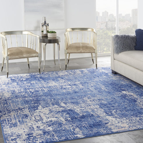 8' X 10' Ivory and Blue Abstract Distressed Area Rug