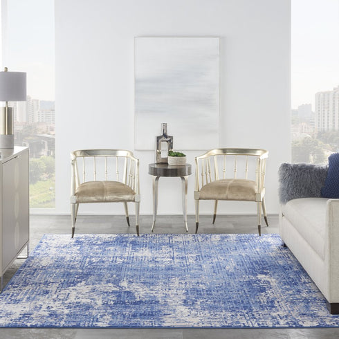 8' X 10' Ivory and Blue Abstract Distressed Area Rug