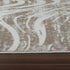 8' X 11' Beige and Brown Abstract Distressed Area Rug