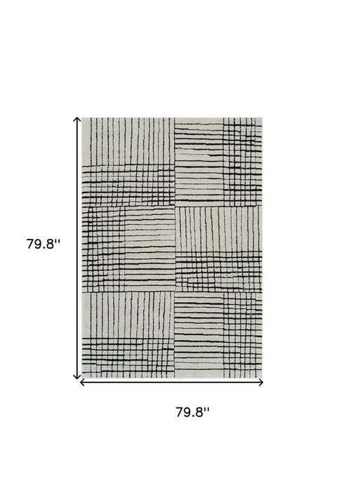 8' X 11' Cream and Black Abstract Distressed Area Rug