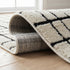 8' X 11' Cream and Black Abstract Distressed Area Rug