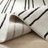 8' X 11' Cream and Black Abstract Distressed Area Rug