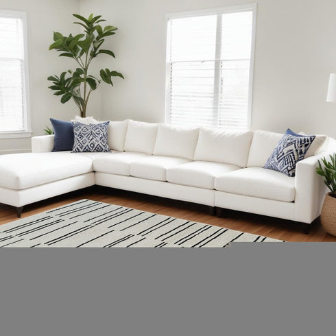 8' X 11' Cream and Black Abstract Distressed Area Rug