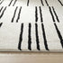 8' X 11' Cream and Black Abstract Distressed Area Rug