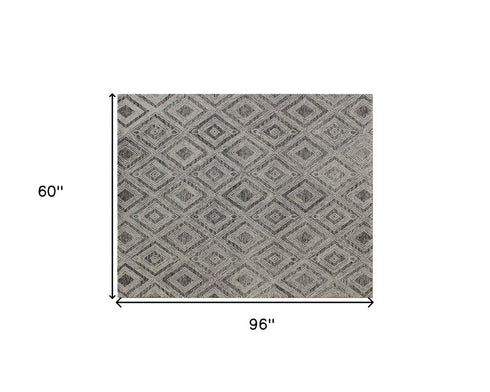 5' X 8' Black and Ivory Wool Abstract Geometric Hand Tufted Non Skid Area Rug