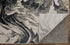9' X 12' Ivory Black and Taupe Abstract Power Loom Area Rug